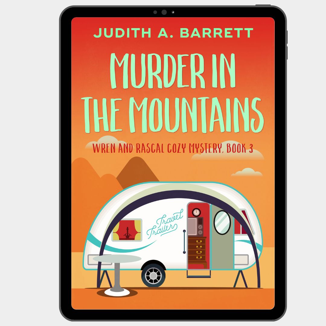 Book cover of 'Murder in the Mountains' by Judith A. Barrett on a tablet screen.